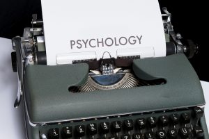 The word Psychology typed on a typewriter. 